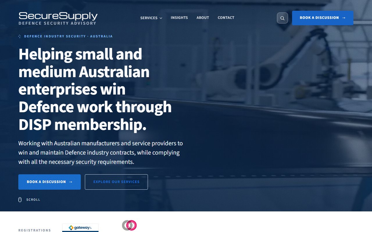 The SecureSupply home page, headline about Defence contracts over a photograph of a manufacturing floor.